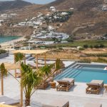 Palm trees, pool and beach view