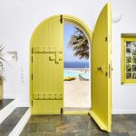 Yellow door to the pool deck