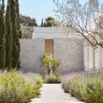 villa entrance with impressive trees