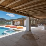 Shaded lounge area by the pool