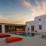 red pillows by the pool