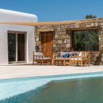 Relax in the lounge area by the infinity pool