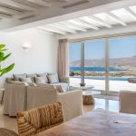 Living room opening to the pool deck