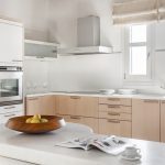 white kitchen with wooden elements