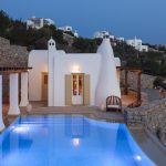 Pool deck at night luxury villa in Mykonos