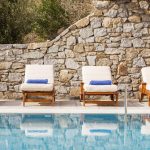Pool and sun beds in villa Iris