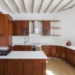 wooden fully equipped kitchen in Mykonian villa