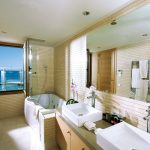 En-suite bathroom with double marble sinks