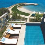 Swimming pool with view of the private beach