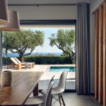 dining area open to the pool deck