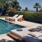 Pool and sun loungers at villa marietta