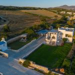 Drone picture of the villa, garden and chapel in Paros