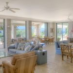 Spacious living space with ceiling fans