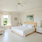 Master en-suite bedroom with ceiling fan
