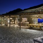the pool deck at night in the luxury villa Zeus
