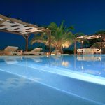 Night lights of the pool deck at villa Anatoli