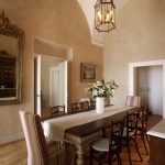 Indoor wooden dining table at villa Captain in Santorini