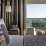 Master bedroom with window overlooking the pool