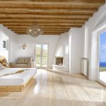 Master bedroom with wooden elements and large private balcony
