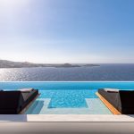 Infinity pool view to Psarou bay in Mykonos