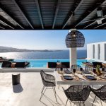Outdoor dining with sea view in Mykonos
