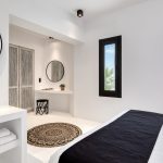 en-suite bedroom with king-size bed