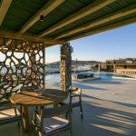 Pool deck of villa Moni in Aleomandra