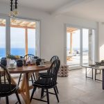 Living room opening to the pool deck