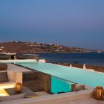 Night view of the pool and the sea