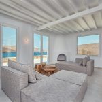 Living area with pool and sea view