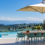 Breakfast by the pool of villa Ionian