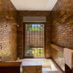 traditional solid brick in the en-suite bathroom