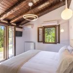 elegant en-suite bedroom with wood details