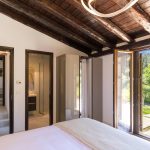 double bedroom with wooden roof at villa Ionian