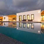 Night lights in the pool at villa Faragas