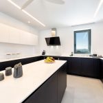 Kitchen with black and white marbles