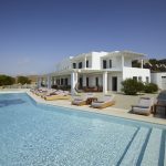 Large infinity swimming pool in Myconian Villa Emerald