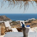 Relax with wine and spectacular view of Kalafatis Beach