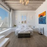 Master Bedroom with large window and endless sea view