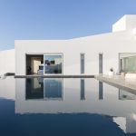 Private swimming pool and white walls